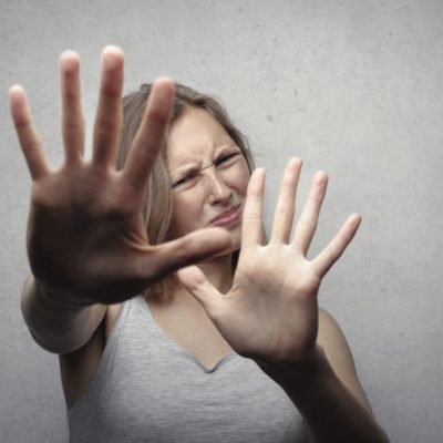 Photo by Andrea Piacquadio: https://www.pexels.com/photo/woman-in-gray-tank-top-looking-frightened-3812729/